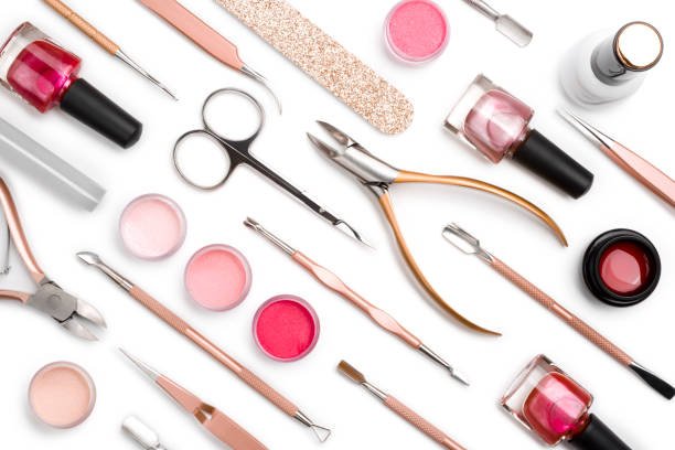 Cosmetics and accessories for manicure or pedicure isolated on white background